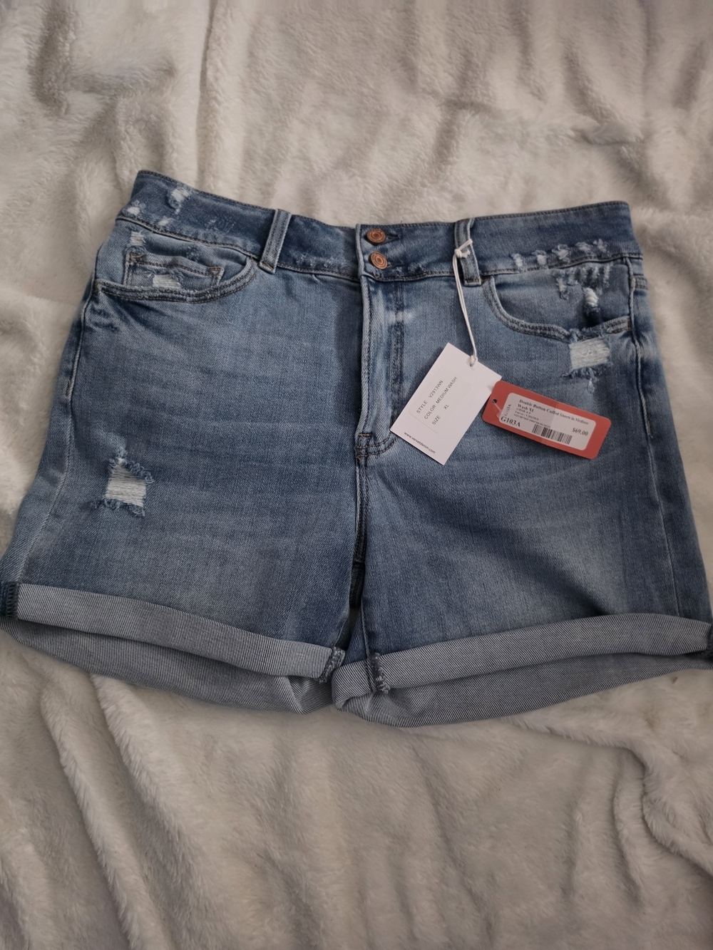 Women’s Light Blue Distressed Denim Roll-Cuff Shorts
